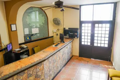 Una cocina o zona de cocina en OYO Hotel Plaza Veracruz Centro Historico