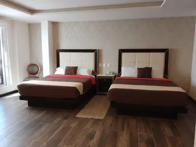 Cama o camas de una habitación en Mansion Azul Cholula