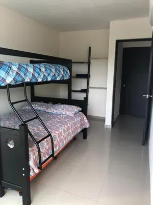 Cama o camas de una habitación en Departamento Acapulco Diamante