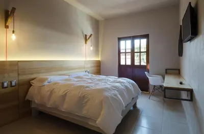 Cama o camas de una habitación en Comala Bed & Breakfast