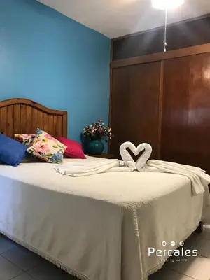 Cama o camas de una habitación en Inmobiliaria Percales