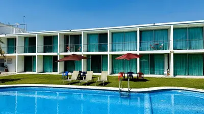 Piscina en o cerca de Hotel Palmas Cocoyoc