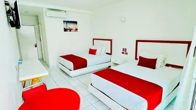 Cama o camas de una habitación en Hotel Palmas Cocoyoc