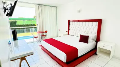Cama o camas de una habitación en Hotel Palmas Cocoyoc