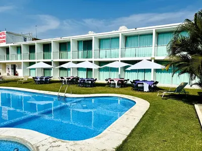 Piscina en o cerca de Hotel Palmas Cocoyoc