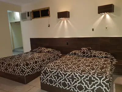 Cama o camas de una habitación en Hotel Delfines Del Mar Acapulco