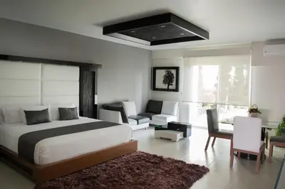 Cama o camas de una habitación en Hotel Aquetzalli