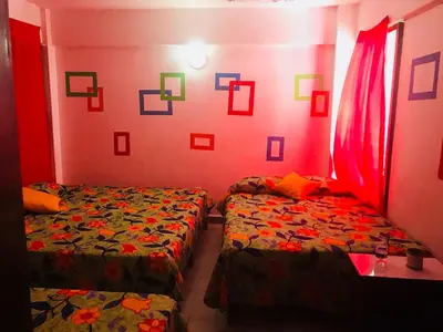 Cama o camas de una habitación en Hotel El Kiosco