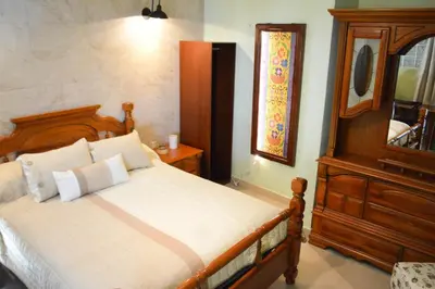Cama o camas de una habitación en Hotel Las Candelas de Huamantla