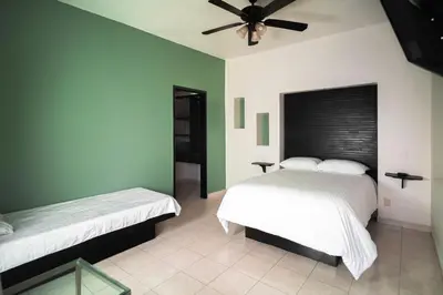 Cama o camas de una habitación en Hotel Quinta Moctezuma