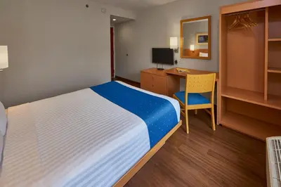 Cama o camas de una habitación en City Express by Marriott Tuxtla Gutiérrez