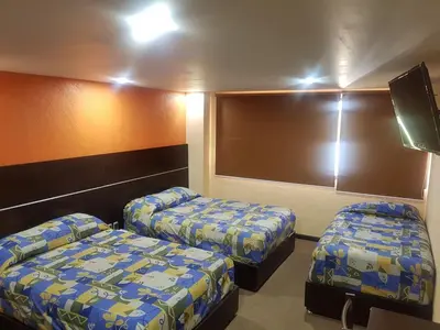Cama o camas de una habitación en Oaxaca Inn Reforma