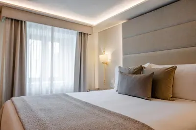 Cama o camas de una habitación en Quinta Real Puebla