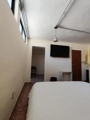 Cama o camas de una habitación en Hostalgia Casa Zul