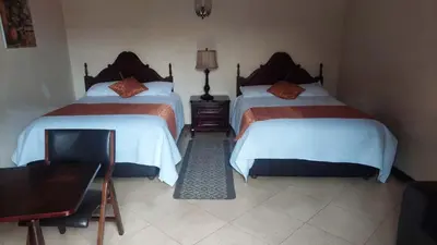 Cama o camas de una habitación en La Casona de los Gómez