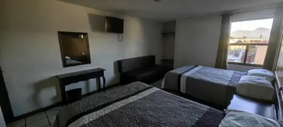 Cama o camas de una habitación en Hotel Avenida
