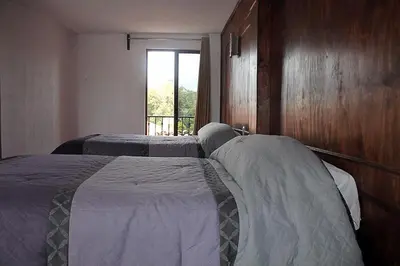 Cama o camas de una habitación en Hotel Avenida