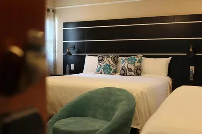 Cama o camas de una habitación en Hotel Cacaxtla