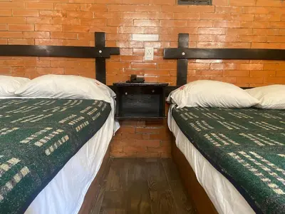 Cama o camas de una habitación en Hotel San Agustin