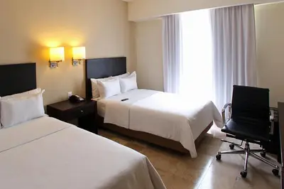 Cama o camas de una habitación en Fiesta Inn Coatzacoalcos