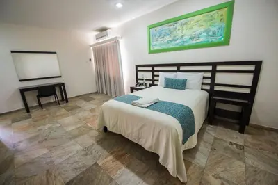 Cama o camas de una habitación en Hotel Andiroba Palace