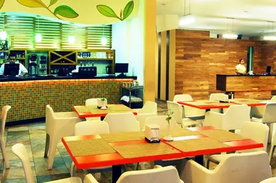Un restaurante o sitio para comer en Hotel Andiroba Palace