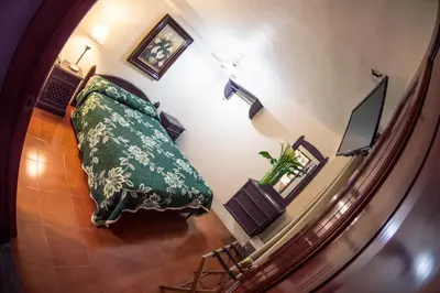 Cama o camas de una habitación en Hotel posada casa regia