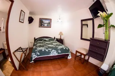 Cama o camas de una habitación en Hotel posada casa regia