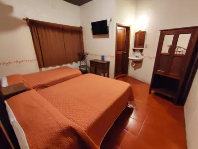 Cama o camas de una habitación en El Encuentro