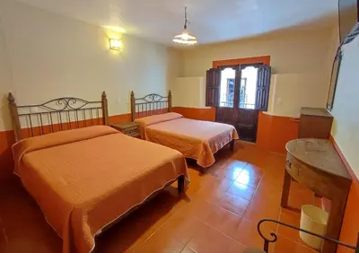 Cama o camas de una habitación en El Encuentro