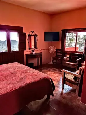 Cama o camas de una habitación en El Encuentro