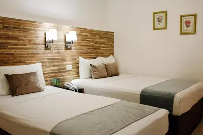 Cama o camas de una habitación en Hotel San Miguel, en el Centro - Desayuno Incluido