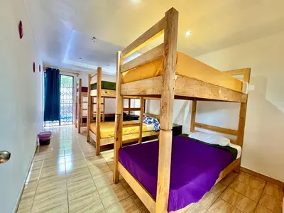 Cama o camas de una habitación en Hostal Amate Taxco
