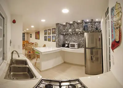 Una cocina o zona de cocina en HominngBird Acapulco