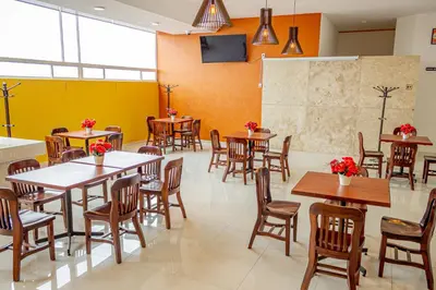 Un restaurante o sitio para comer en Hotel Klimt