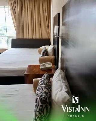 Cama o camas de una habitación en Hotel Vista Inn Premium