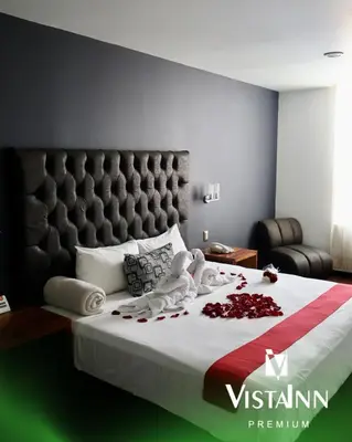 Cama o camas de una habitación en Hotel Vista Inn Premium