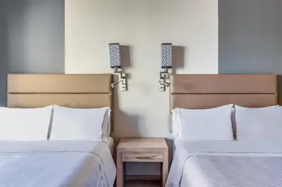 Cama o camas de una habitación en Fiesta Inn Cuernavaca