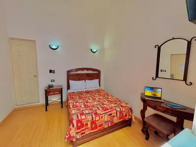 Cama o camas de una habitación en Hotel La Alhondiga