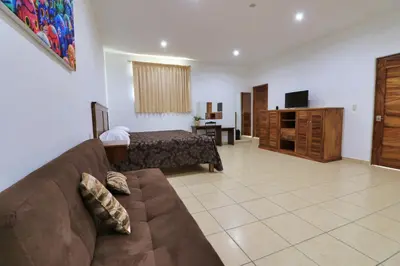 Una televisión o centro de entretenimiento en Hotel Casa Pridda