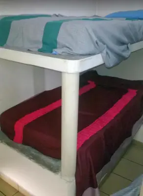 Cama o camas de una habitación en Posada Joan Sebastian