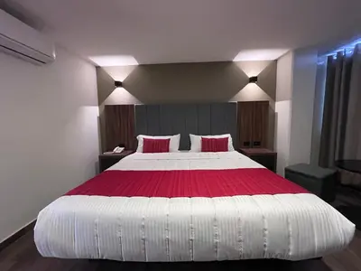 Cama o camas de una habitación en Hotel Granada