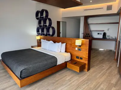 Cama o camas de una habitación en Sonata Hotel Puebla Angelópolis Distrito Sonata