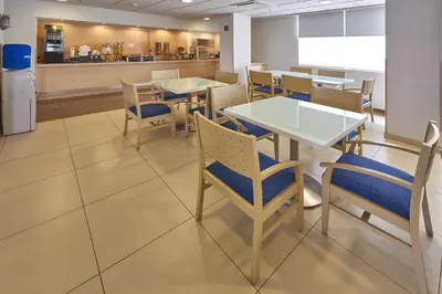 Un restaurante o sitio para comer en City Express by Marriott Puebla FINSA