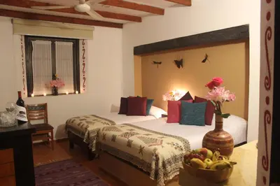 Cama o camas de una habitación en Hotel Boutique La Casona de Don Porfirio