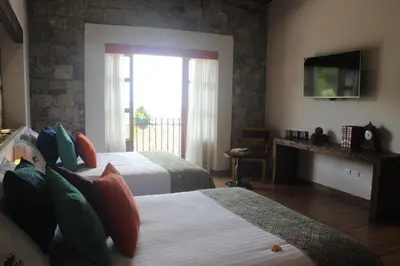 Cama o camas de una habitación en Hotel Boutique La Casona de Don Porfirio