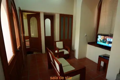 Una televisión o centro de entretenimiento en Hotel Oaxaca Mágico