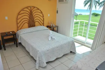 Cama o camas de una habitación en Hotel Boca de Ovejas