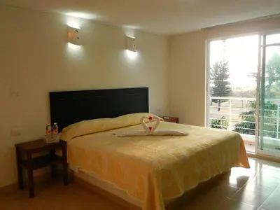 Cama o camas de una habitación en Hotel Boca de Ovejas