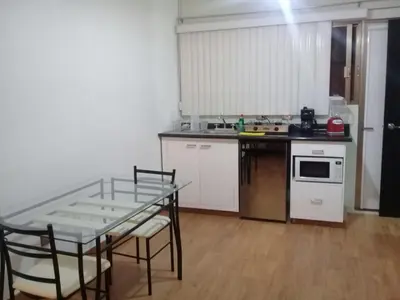 Una cocina o zona de cocina en Habitaciones amuebladas Veracruz Logos